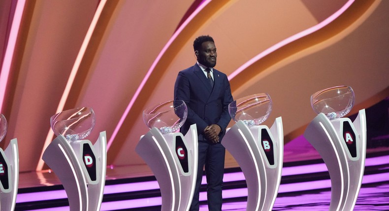 Okocha helped in conducting the draws in Qatar