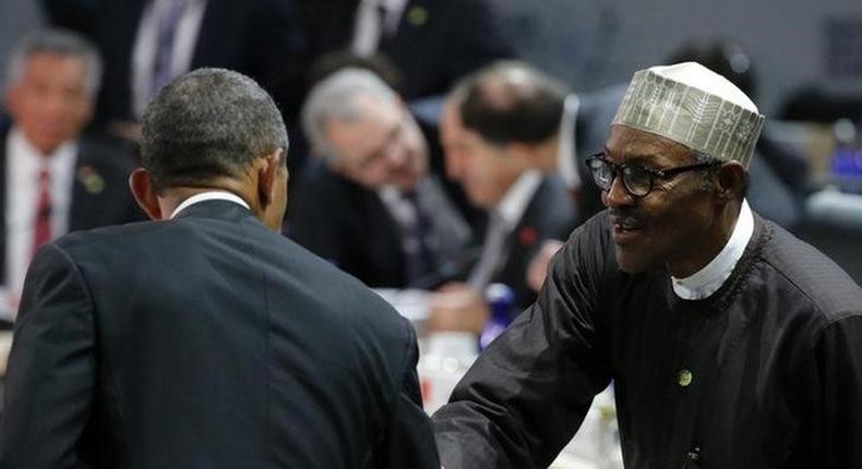 Nigeria's President Muhammadu Buhari (R) greets U.S. President Barack Obama before the start of the second plenary session of the Nuclear Security Summit in Washington April 1, 2016.