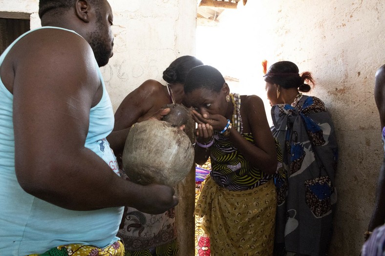 Voodoo festival in Benin.  Water drinking ceremony at Dah-Gbo Zonon Monastery.  January 2023