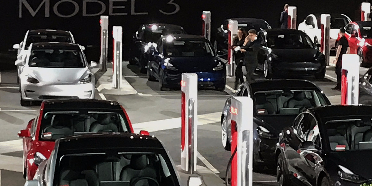 Tesla could have millions of cars on the road by 2023 — taking a huge lead in the self-driving car race