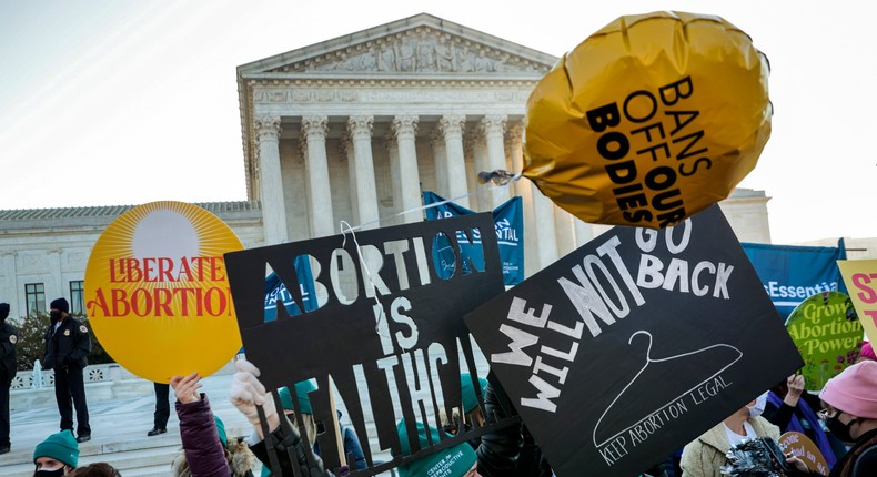 Protesters, demonstrators and activists gather in front of the U.S. Supreme Court as the justices hear arguments in Dobbs v. Jackson Women's Health, a case about a Mississippi law that bans most abortions after 15 weeks, on December 01, 2021.