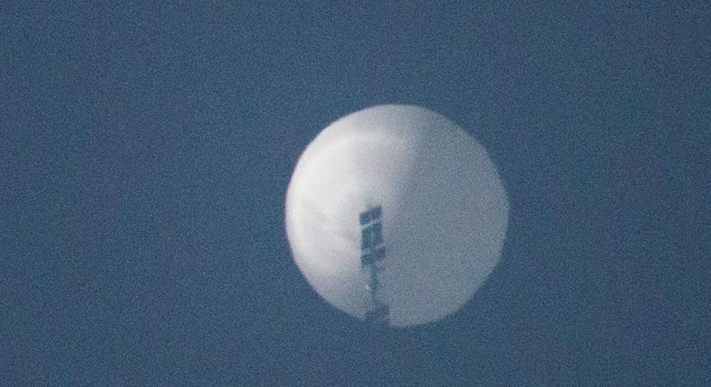 A balloon flies in the sky over Billings, Montana, on February 1, 2022.Chase Doak/via REUTERS