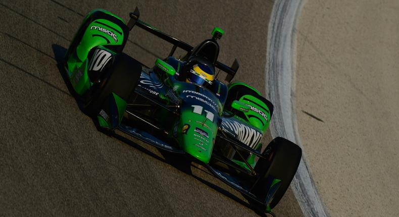 Sebastien Bourdais holds off Helio Castroneves at the ABC Supply Wisconsin 250 in Milwaukee