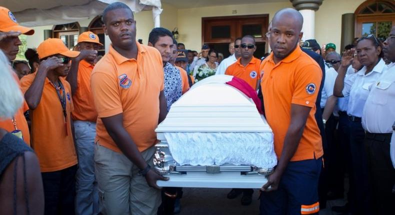 The coffin of Dominican journalist Leonidas Martinez is carried during his funeral in San Pedro de Macoris, Dominican Republic on February 15, 2017, the day after he was shot dead alongside broadcaster Luis Manuel Medina