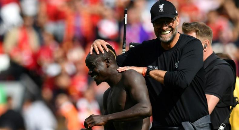 Liverpool manager Jurgen Klopp congratulates Sadio Mane after his two goals against Newcastle at Anfield