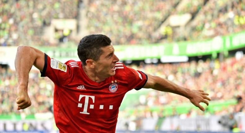 Bayern Munich striker Robert Lewandowski celebrates scoring the first of his two goals