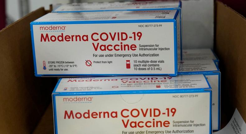 Boxes containing the Moderna COVID-19 vaccine are prepared to be shipped [Business Insider]