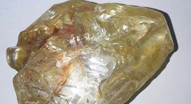 God don bless we tiday, one of preacher Emmanuel Momoh's workers in Sierra Leone shouted brandishing a honey-coloured rock which turned out to be a 706-carat diamond