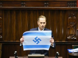 poseł berkowicz pokazał w sejmie flagę izraela ze swastyką. kancelaria