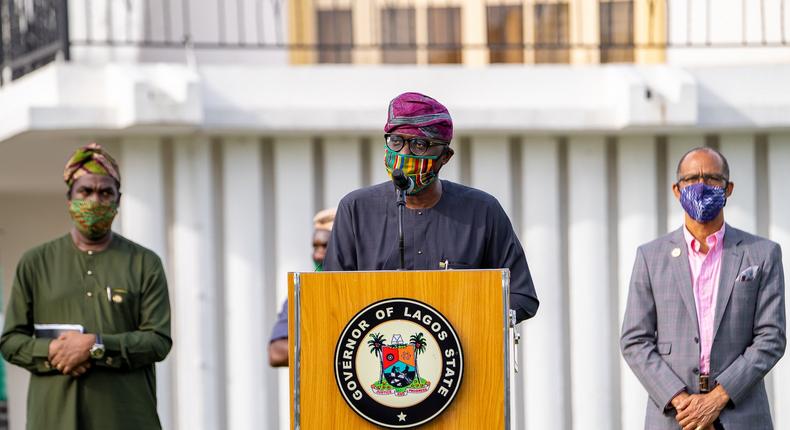 Lagos State governor, Babajide Sanwo-Olu, flanked by deputy governor, Obafemi Hamzat (left), and Commissioner for Health, Akin Abayomi (right) [Twitter/@babajidesanwoolu]