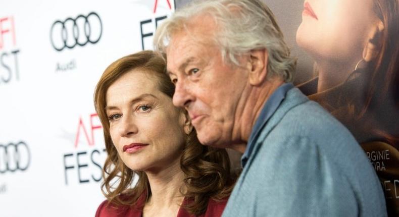 Director Paul Verhoeven (R) and actress Isabelle Huppert attend the premiere of the AFI Tribute to Huppert and the Gala Screening of Elle in Hollywood, California, on November 13, 2016