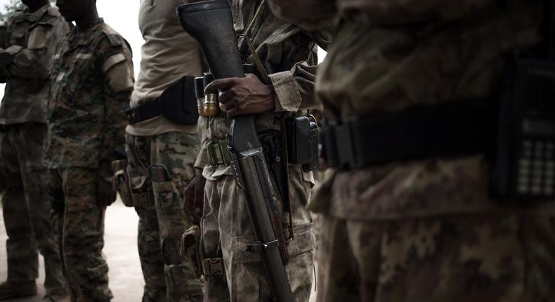 The close security guards of the Union for Peace in Central African Republic (UPC) armed group stand in Bokolobo, near Bambari on March 16, 2019. -FLORENT VERGNES/AFP via Getty Images)