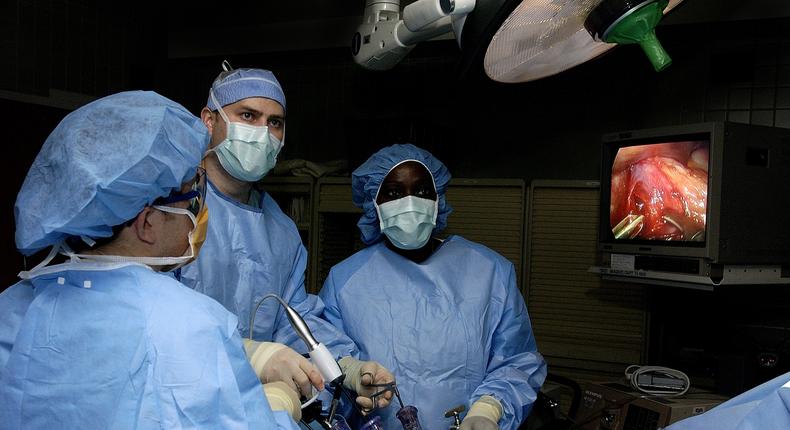 Surgeons perform laparoscopic stomach surgery