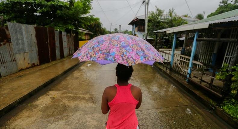 A Nicaraguan resident walks along the El Canal neighbourhood before Hurricane Otto barreled through the region on November 24, 2016