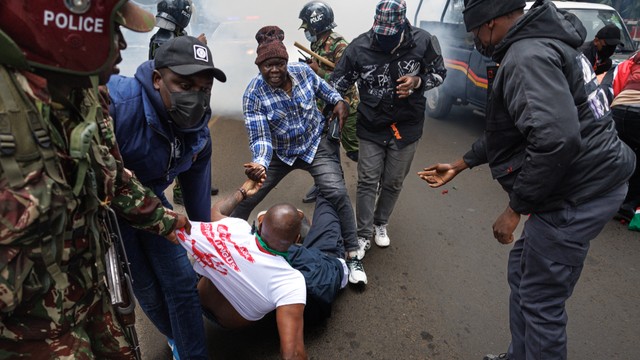 A young protester attacked by Kenyan police. [Getty Images]