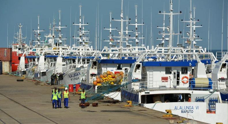 Security guards patrol past the EMATUM fishing fleet docked in Maputo, Mozambique, May 3, 2016. REUTERS/Grant Lee Neuenburg