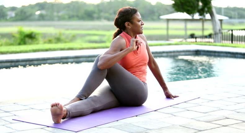 Mature African American Woman Stretching On Yoga Mat Stock Footage Video - Getty Images