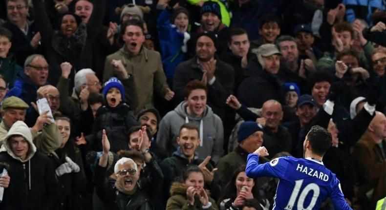 Chelsea's midfielder Eden Hazard (R) celebrates after scoring on November 5, 2016