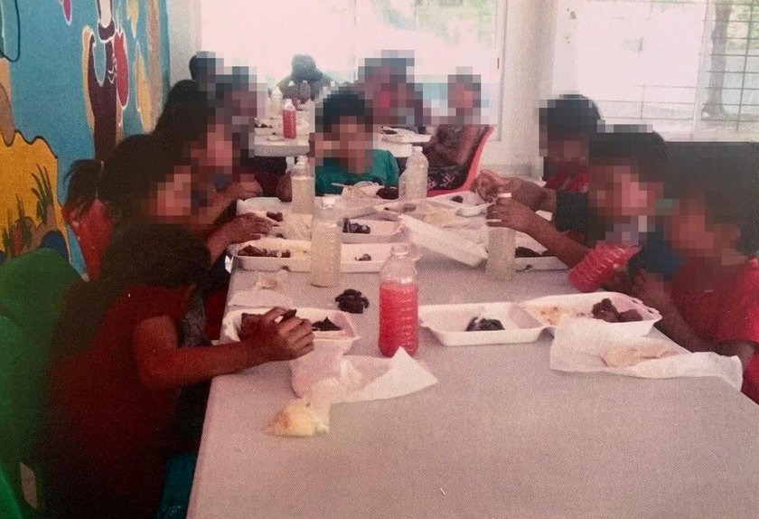 Children rescued from human trafficking network eat their meals in San Cristobal de las Casas