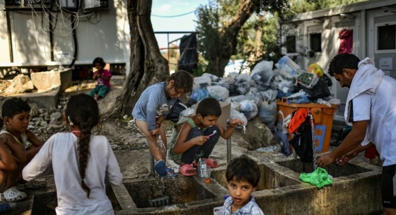 Greece began transferring refugees and migrants from Moria camp and another facility on the island of Lesbos after Doctors Without Borders warned of severe consequences of overcrowding