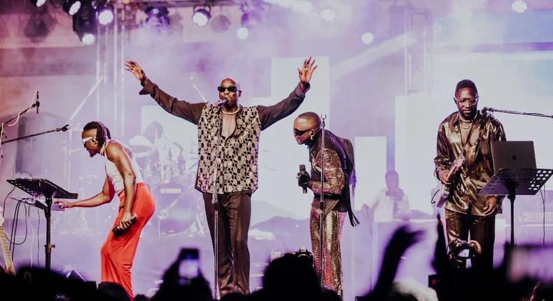 Sauti Sol members during a live performance