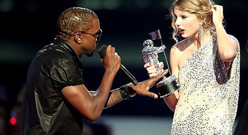 Taylor Swift and Kanye West on stage of the MTV VMAs, where their beef was born, after Kanye interrupted Swift's speech