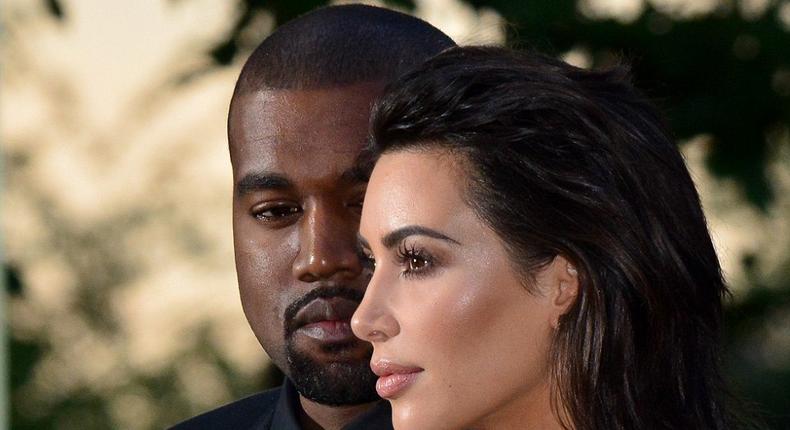 Kanye West and wife Kim Kardashian were all aglow for the Vogue 100 Festival in London.