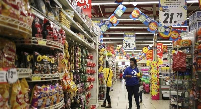 A customer shops at a Shoprite store in Johannesburg, in a file photo. REUTERS/Siphiwe Sibeko