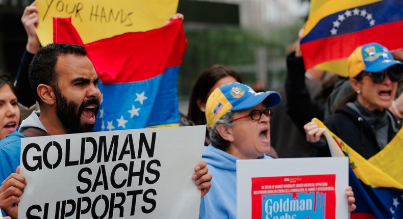 Protesters outside Goldman Sachs' headquarters in New York after the company purchased Venezuelan bonds.