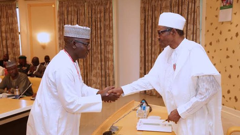 President Muhammadu Buhari in a handshake with Alh Mohammed Nami during the Inauguration of Audit Committee on Recoveries at the State House in Abuja, November 2017.