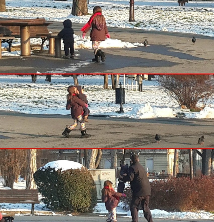 Devojčica nosi brata njihovom tati