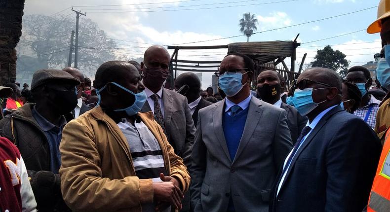 Interior PS Karanja Kibicho with traders from Gikomba Market hours after inferno destroyed goods of unknown value on June 25, 2020