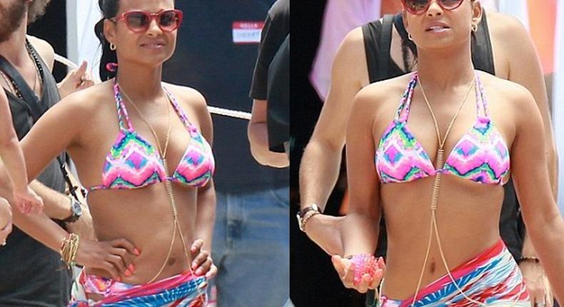 Christina Milan rocking a colourful bikini on set of a new movie, Grandfathered