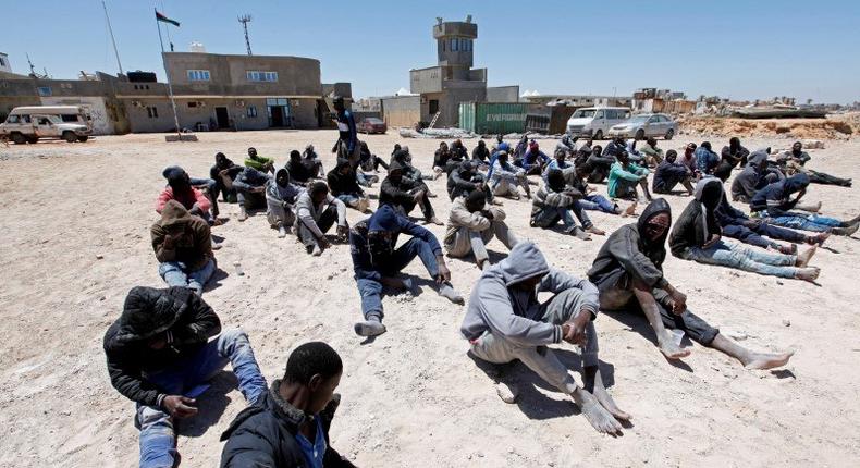 Migrants, who attempted to flee the Libyan coast to head for Europe, are seen after being detained at the coast guard center in the coastal city of Tripoli, Libya, May 16, 2016. 