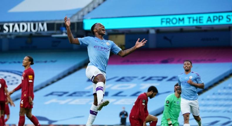 Raheem Sterling celebrates Manchester City's second goal against Liverpool