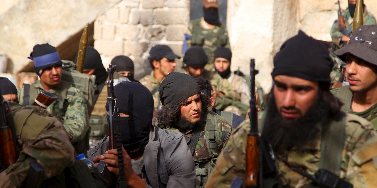 Members of Nusra Front before moving toward their positions during an offensive to take control of the northwestern city of Ariha from forces loyal to Syrian President Bashar Assad, in Idlib province.