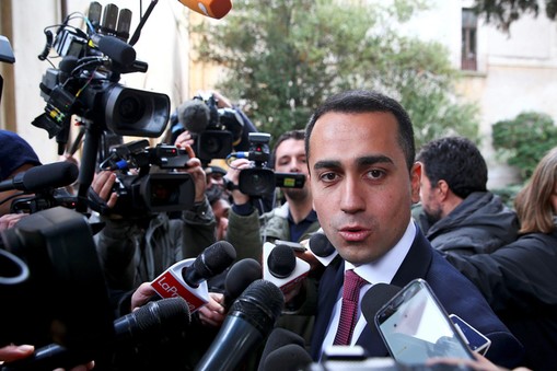 5-Star Movement leader Luigi Di Maio speaks to journalists as he arrives at the Link Campus Universi