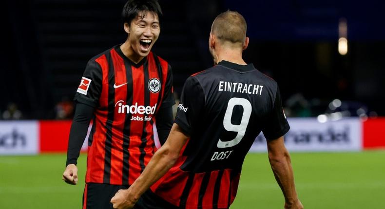 Eintrach Frankfurt's Daichi Kamada celebrates Bas Dost's goal in the Hertha Berlin win