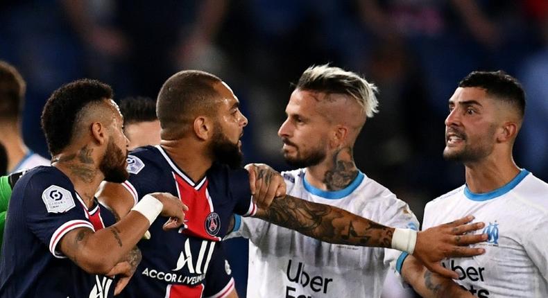 Ready for a rematch: Neymar (left) and Marseille's Spanish defender Alvaro (right) had to be separated in a bad tempered match in September
