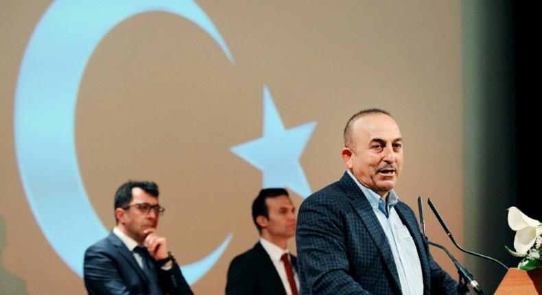 Turkish Foreign Minister Mevlut Cavusoglu gives a speech in the French city of Metz on March 12, 2017