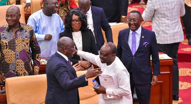 Vice president of Ghana, Dr. Bawumia & Finance Minister Ken Ofori-Atta hug on floor of parliament