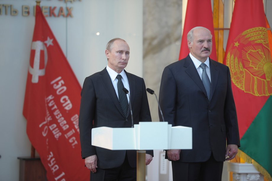 Russian President Vladimir Putin and Belarusian President Alexander Lukashenko during a ceremony to mark the 70th anniversary of the liberation of Belarus from Nazi occupation, at the Belarusian State Museum of the Great Patriotic War in Minsk, July 2, 2014