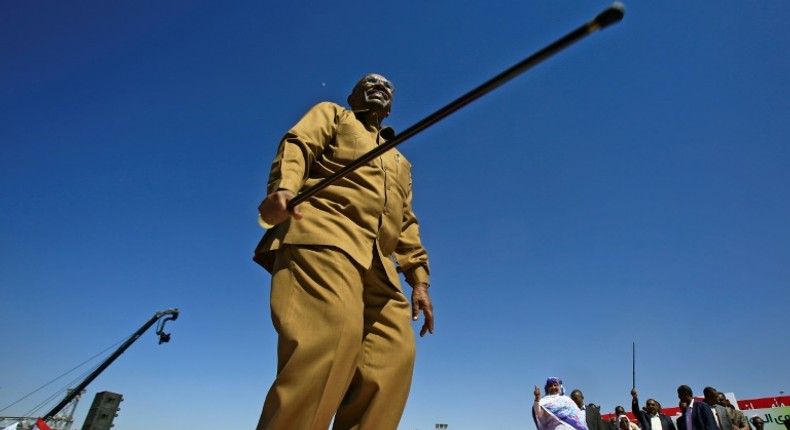 Sudan's President Omar al-Bashir appears during a rally with his supporters in Khartoum on January 9, 2019 as protests calling for an end to his three decades in power rock the country