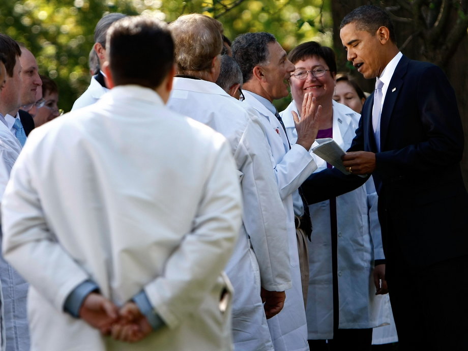 Barack Obama greeting doctors in the Rose Garden following an event at the White House in 2009 in Washington, DC, promoting his healthcare plan.