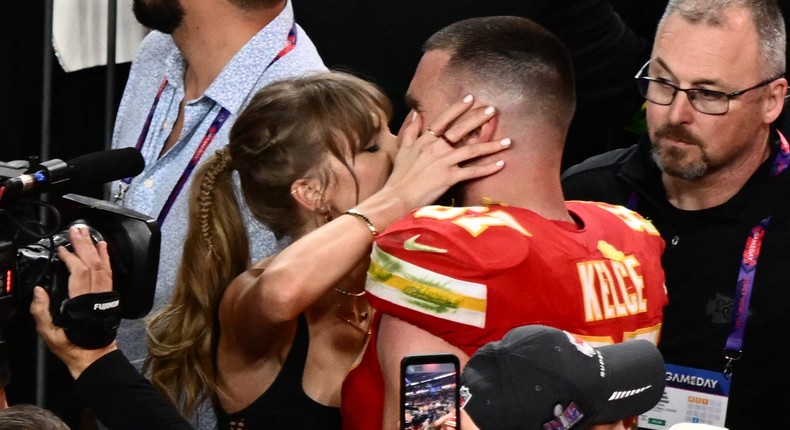 Taylor Swift and Travis Kelce kissing at the Super Bowl.Patrick T. Fallon/AFP via Getty Images