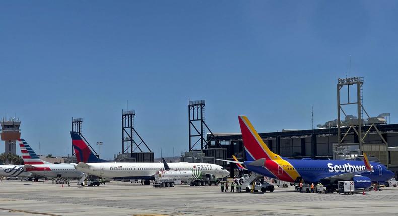 Southwest Airlines, Delta Air Lines, and American Airlines aircraft.DANIEL SLIM/AFP/Getty