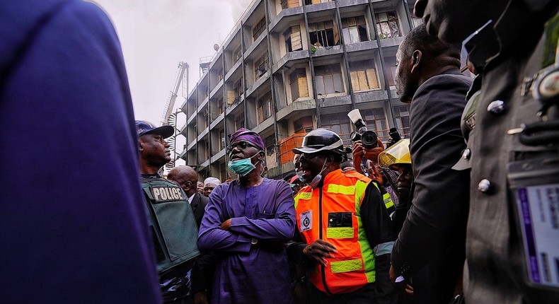 Governor Babajide Sanwo-Olu visits the scene of the fire incident at Balogun Market on Lagos Island. [Twitter/@jidesanwoolu]