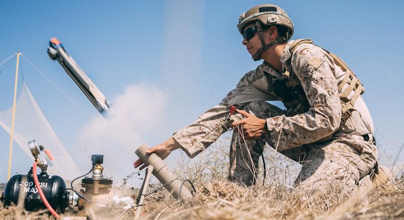 A US Marine launches a Switchblade drone during an exercise at Marine Corps Base Camp Pendleton in California, September 2, 2020.