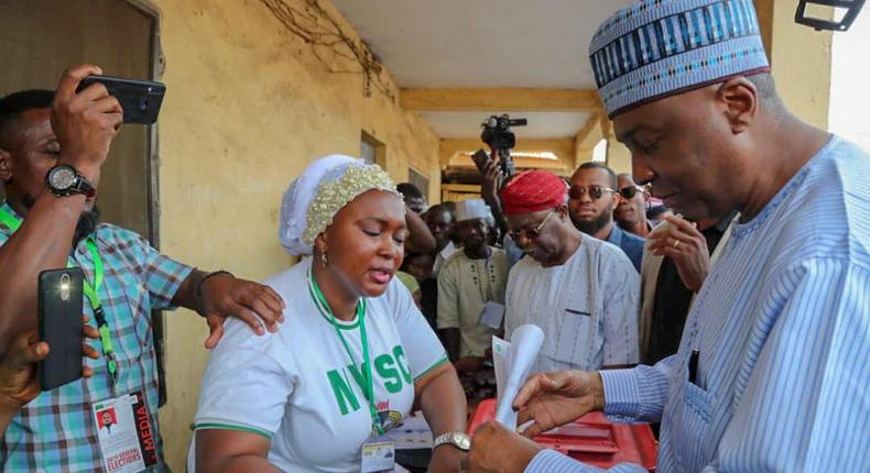 Saraki at his polling unit to cast his vote with his wife1