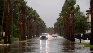 Hurricane Helenes powerful storm surge flooded streets in coastal areas like St. Pete Beach. At least one hurricane-related death was reported in Florida.